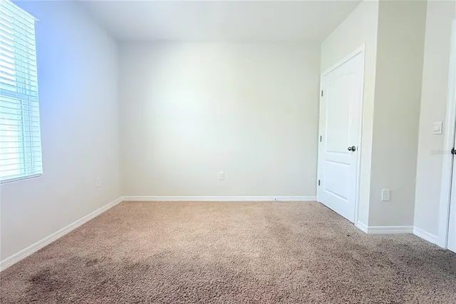 a view of an house with backyard