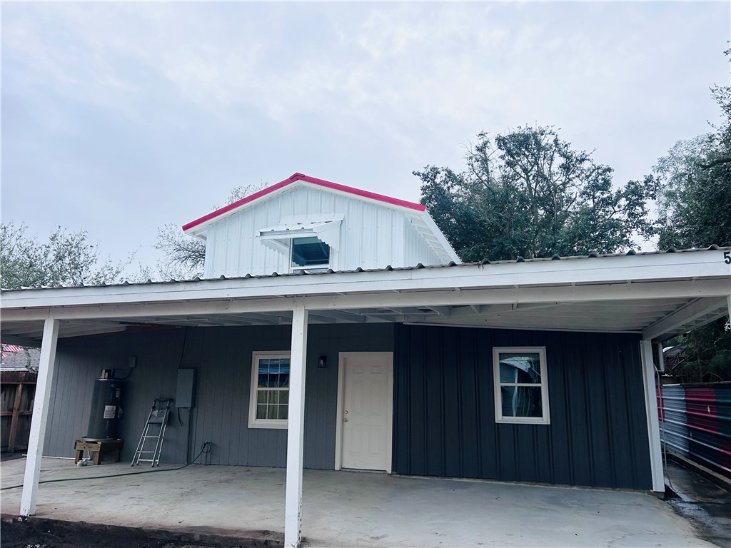 a view of a house with a garage and a garage