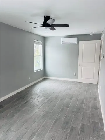 a view of an empty room and window