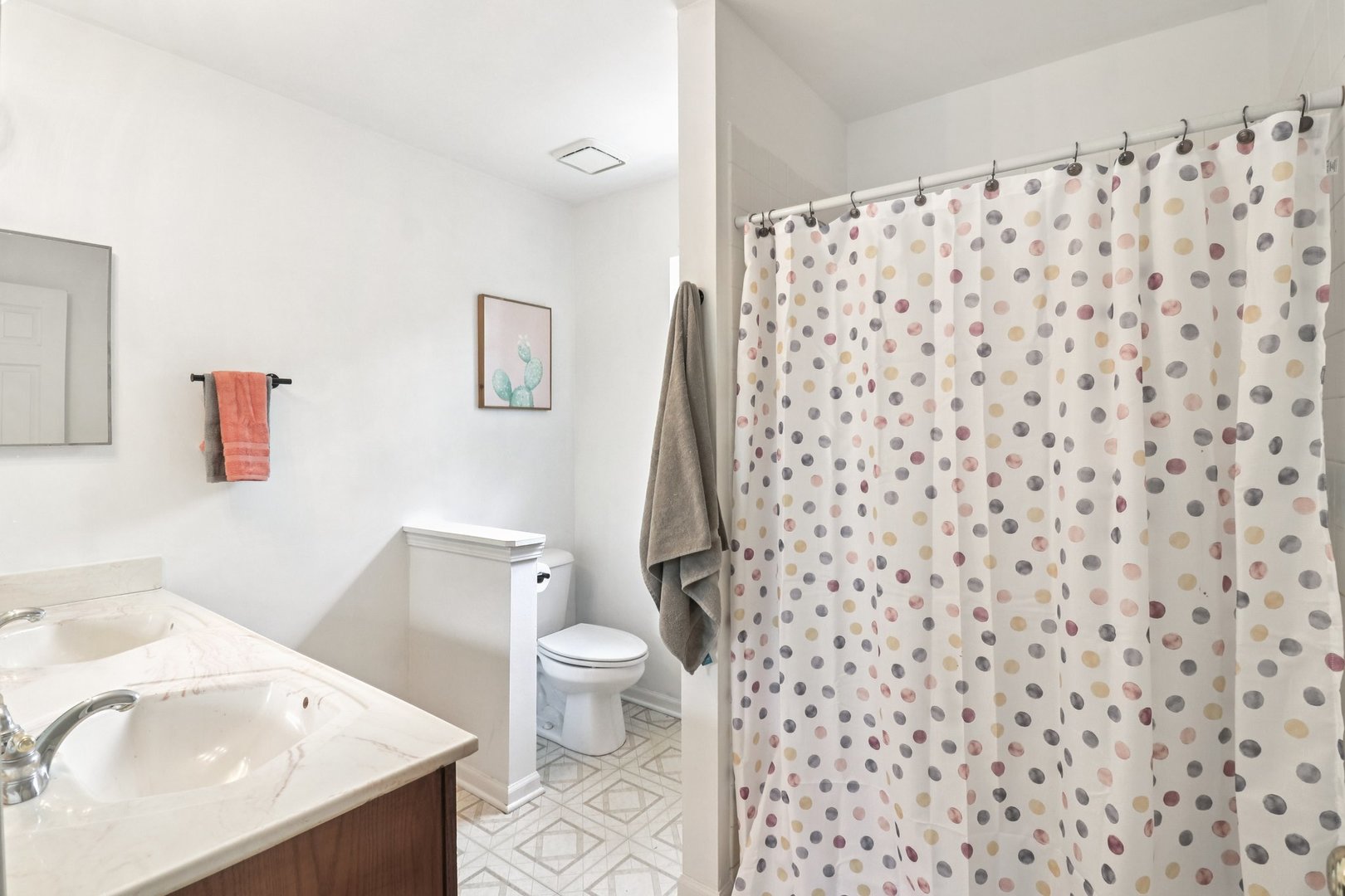 1256 Edgewater Lane Antioch, IL 60002 - Photo 21 of 45 a white toilet sitting next to a bathroom sink