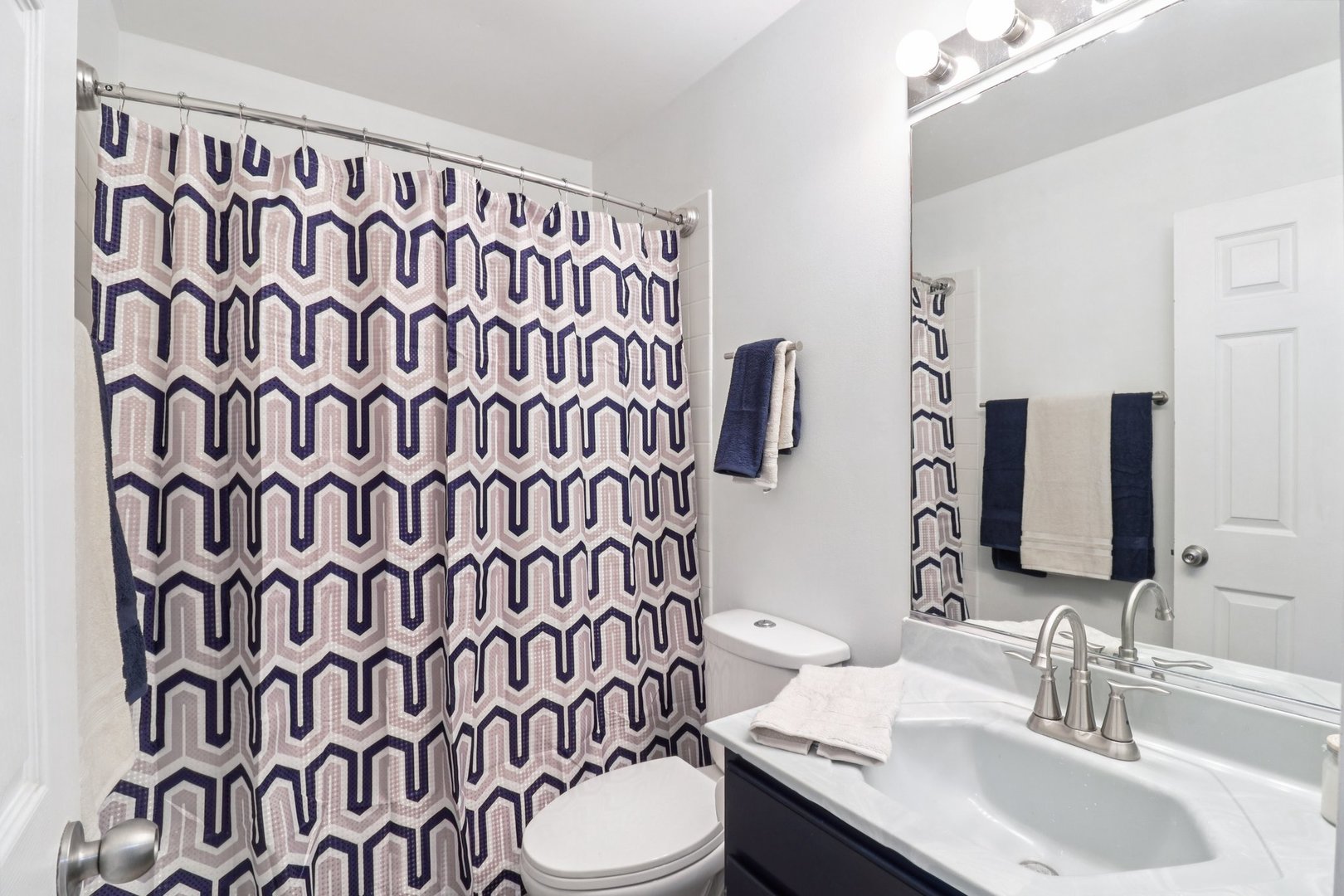 1256 Edgewater Lane Antioch, IL 60002 - Photo 29 of 45 a bathroom with a sink and a mirror
