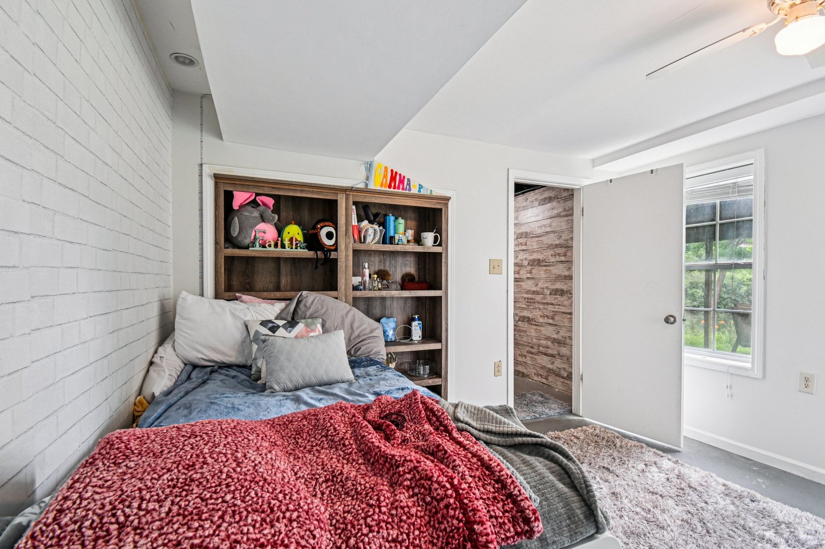 1256 Edgewater Lane Antioch, IL 60002 - Photo 33 of 45 a bedroom with a bed and wooden floor