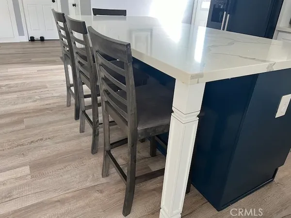 a kitchen with a stove and a cabinets