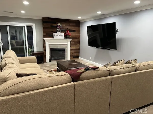 a living room with furniture and a rug