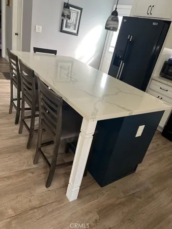 a kitchen that has a sink and a stove