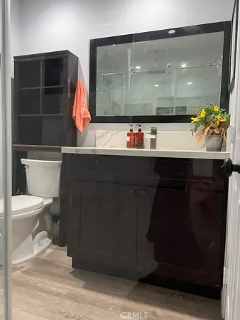 a bathroom with a sink and mirror