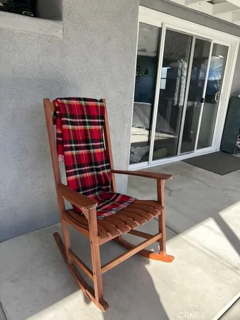 a kitchen with stainless steel appliances granite countertop a refrigerator and a stove