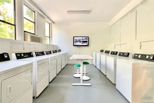 a kitchen with counter top space and sink