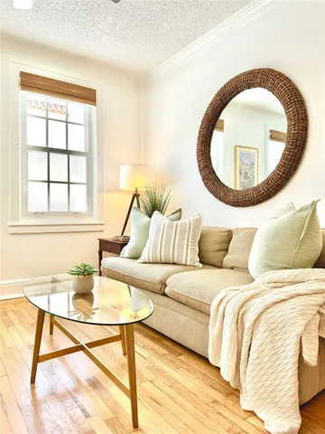 a living room with a couch and a table