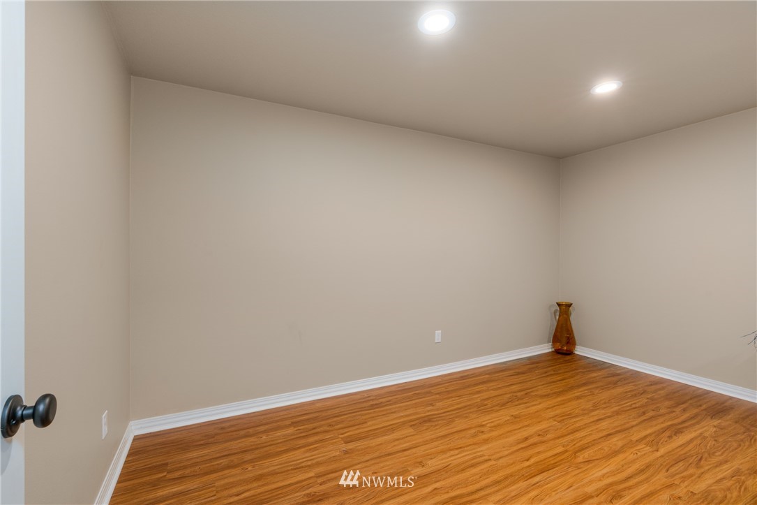 152 Brockway Road Chehalis, WA 98532 - Photo 22 of 26 a view of empty room with wooden floor
