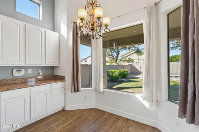 a view of a kitchen from the hallway