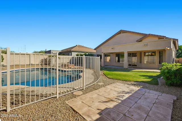 a view of a house with swimming pool