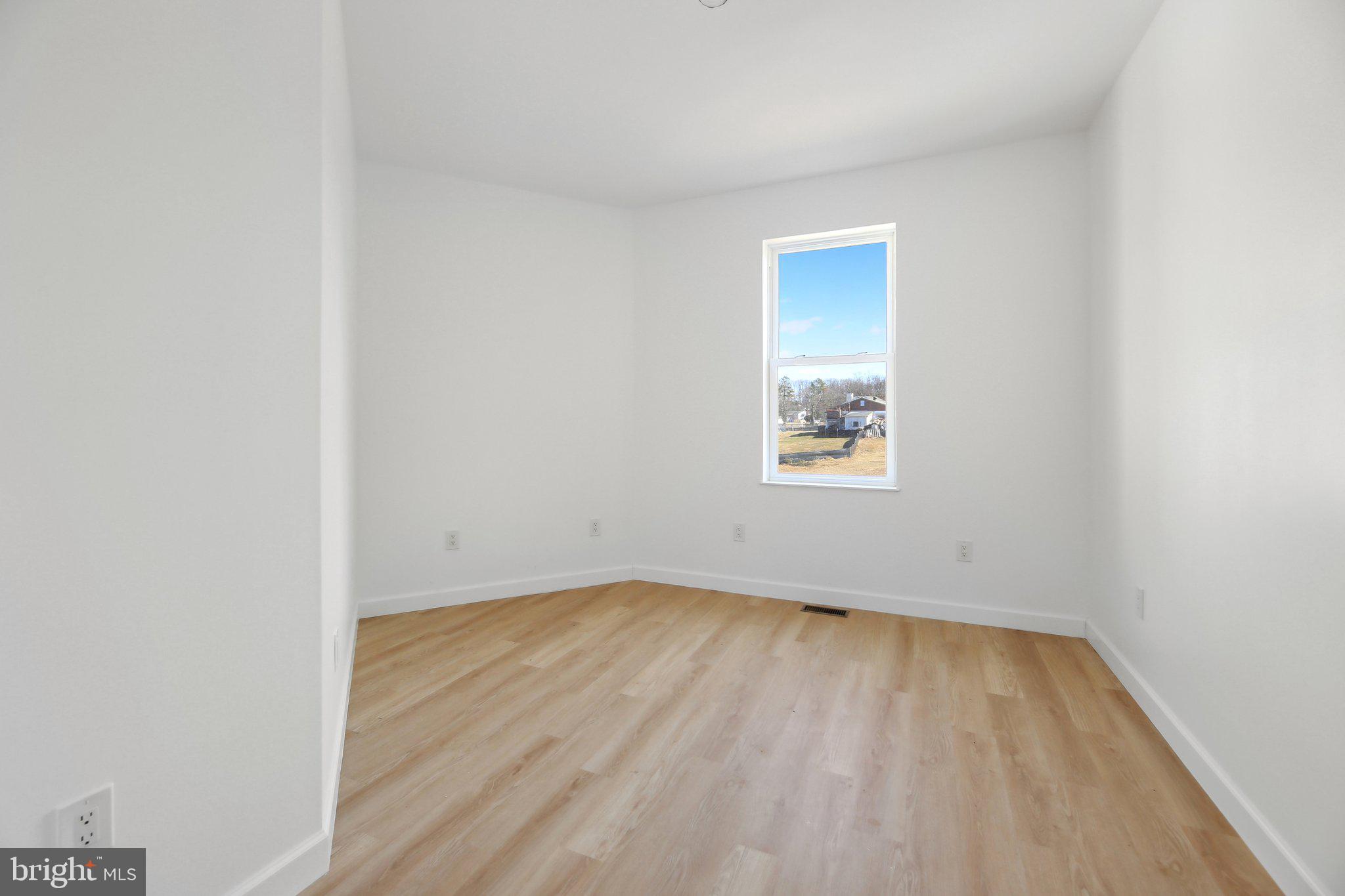 8325 Grove Angle Road Ellicott City, MD 21043 - Photo 20 of 57 an empty room with a window