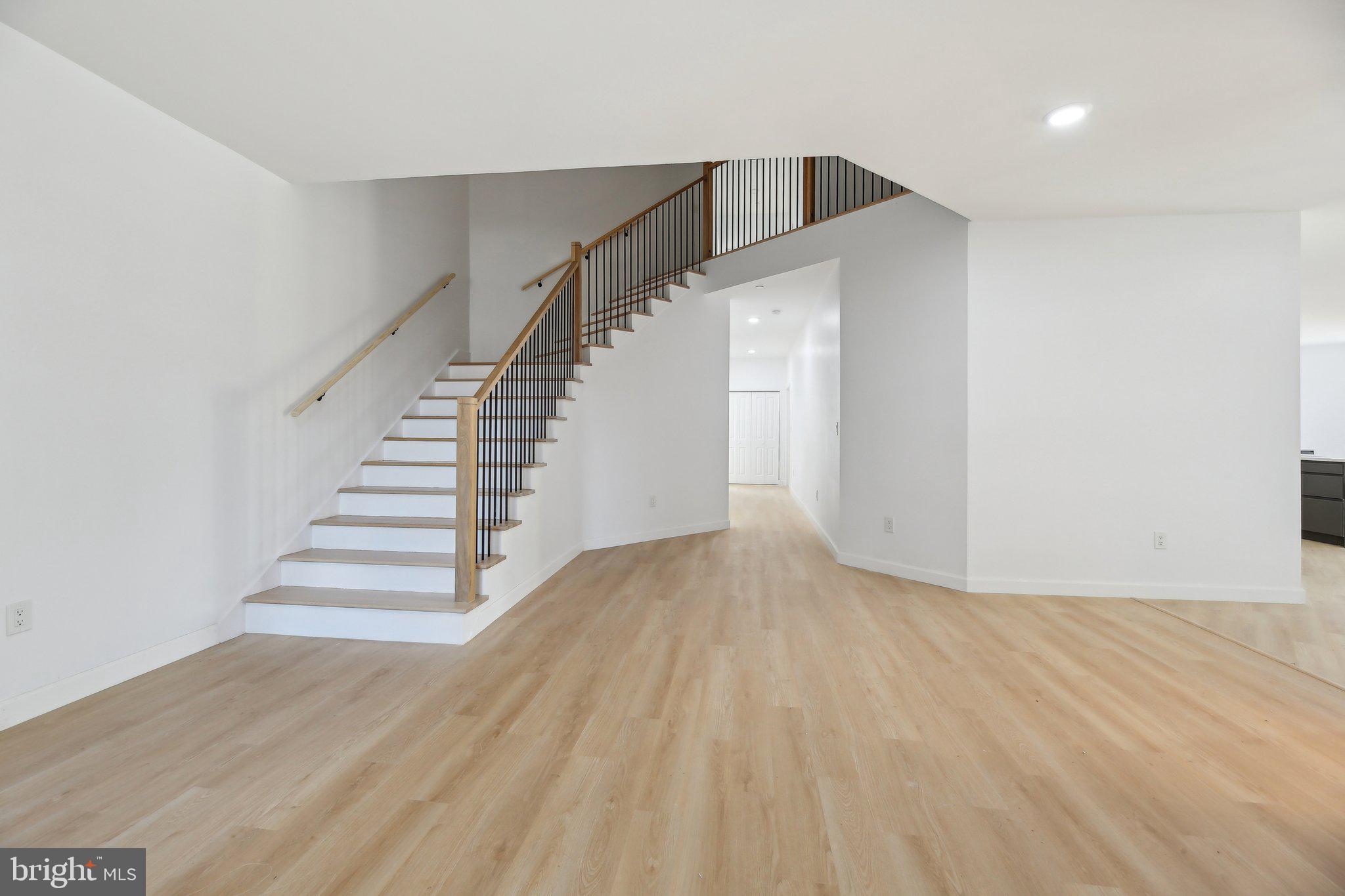 8325 Grove Angle Road Ellicott City, MD 21043 - Photo 21 of 72 a view of entryway with wooden floor