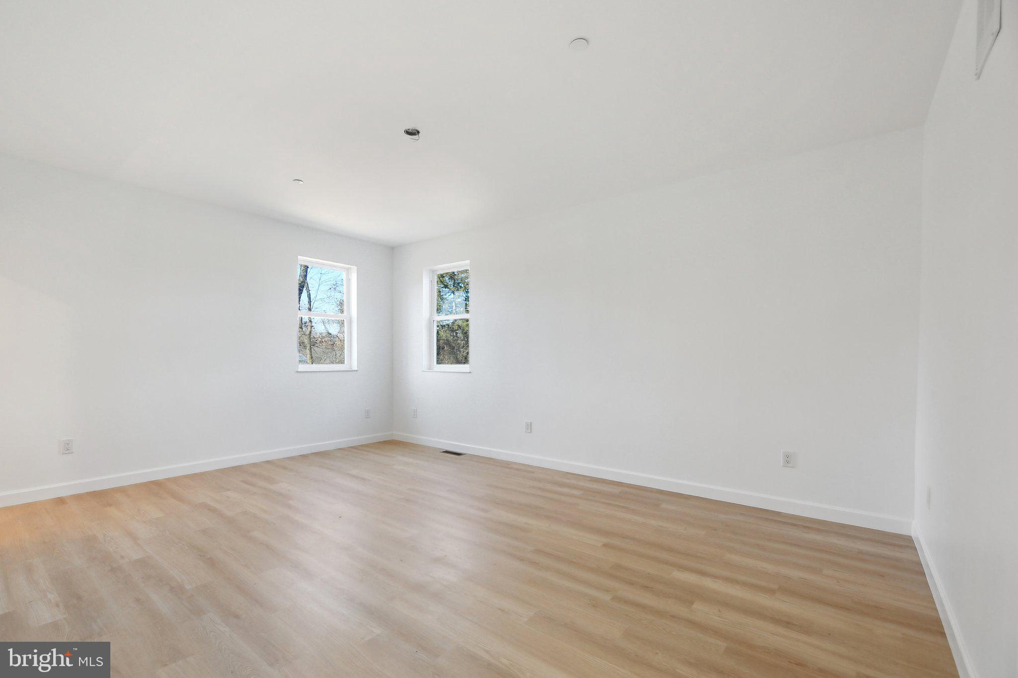8325 Grove Angle Road Ellicott City, MD 21043 - Photo 32 of 57 an empty room with a window