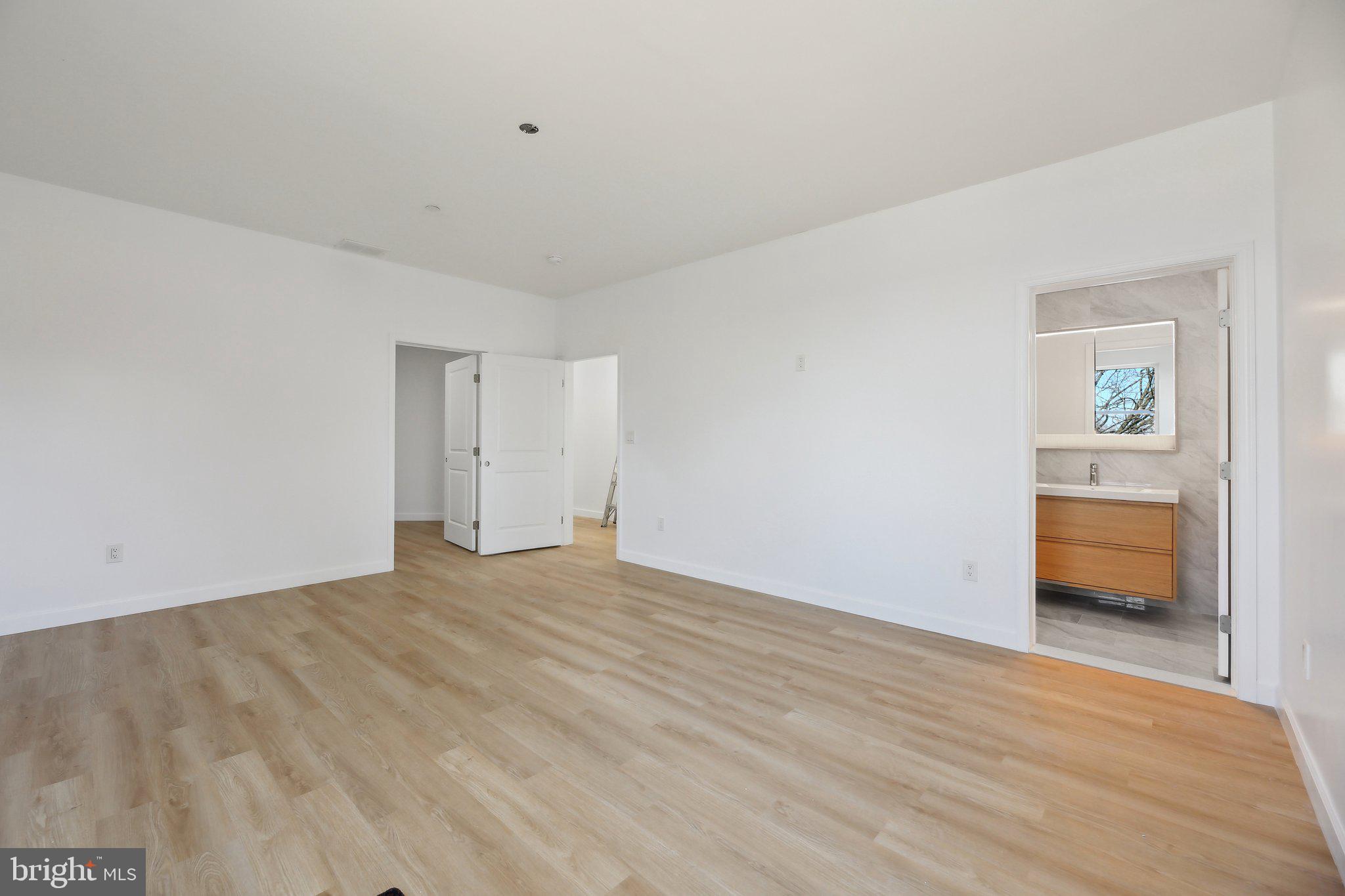 8325 Grove Angle Road Ellicott City, MD 21043 - Photo 40 of 57 a view of an empty room and a window