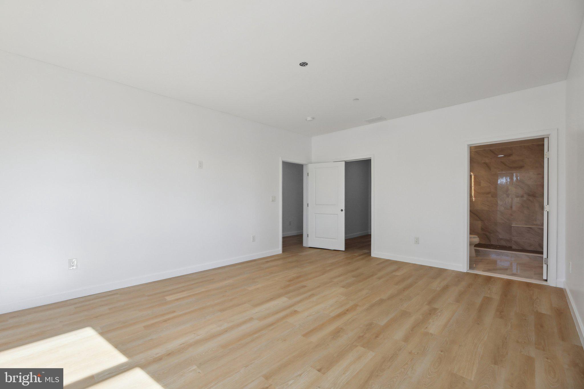 8325 Grove Angle Road Ellicott City, MD 21043 - Photo 49 of 72 a view of an empty room