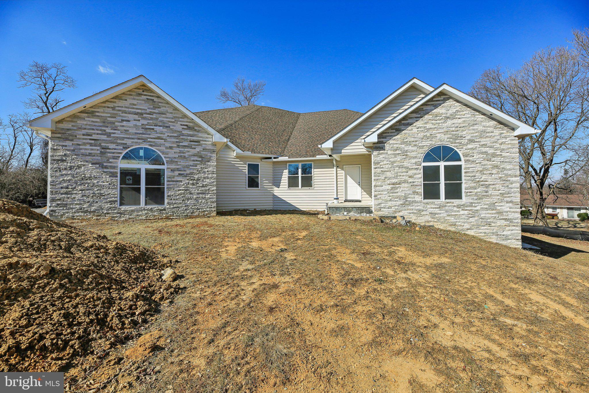 8325 Grove Angle Road Ellicott City, MD 21043 - Photo 50 of 57 front view of a house with yard