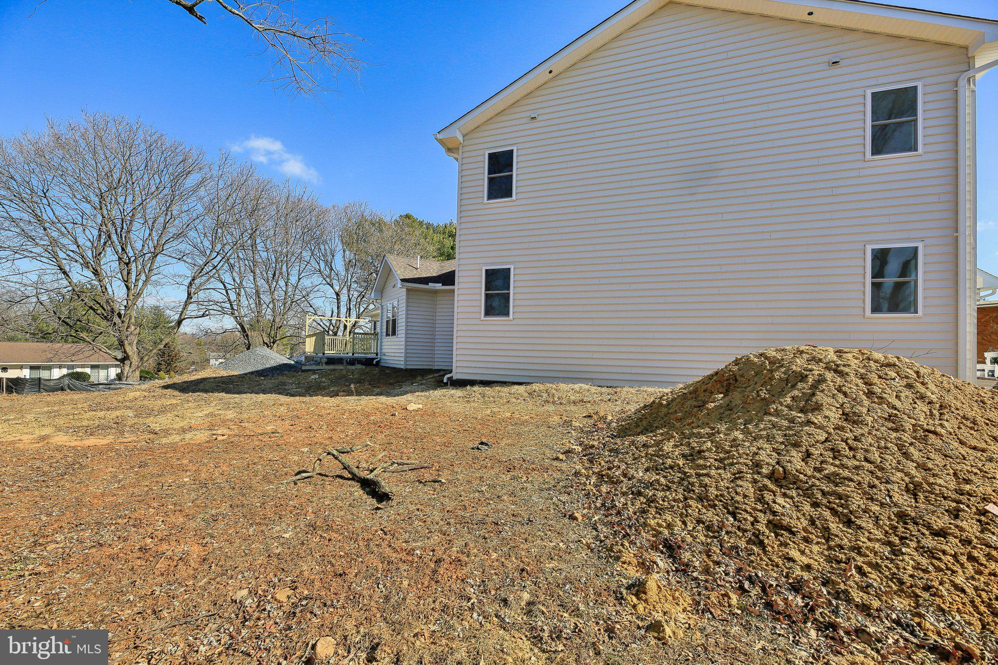 8325 Grove Angle Road Ellicott City, MD 21043 - Photo 53 of 57 a view of a backyard of the house