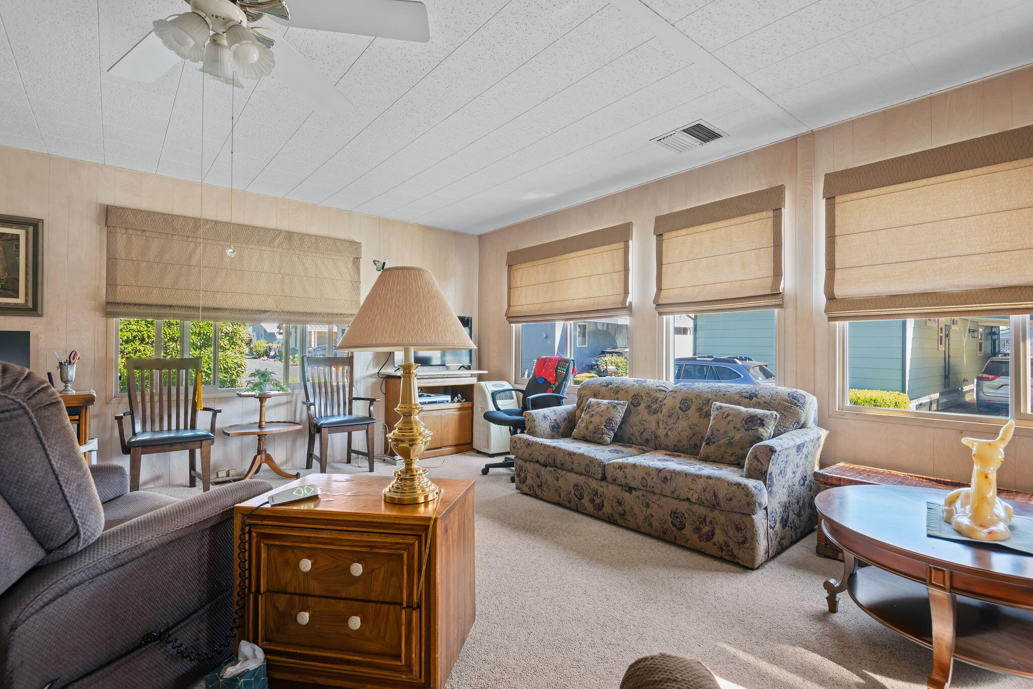 333 Old Mill Road, Unit 317 Santa Barbara, CA 93110 - Photo 5 of 12 a living room with furniture and a large window