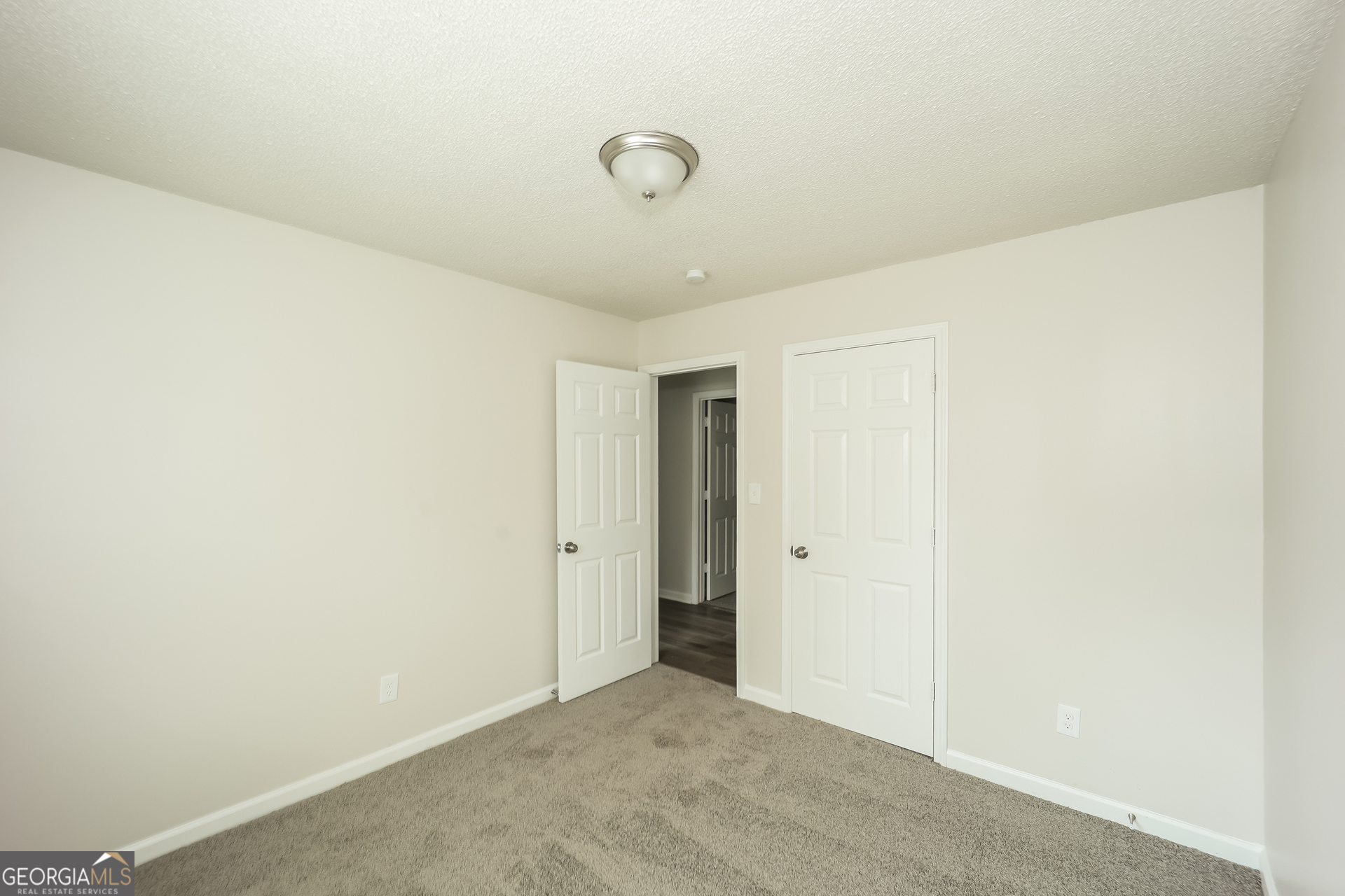 202 Wesley Mill Way Villa Rica, GA 30180 - Photo 11 of 17 a view of an empty room