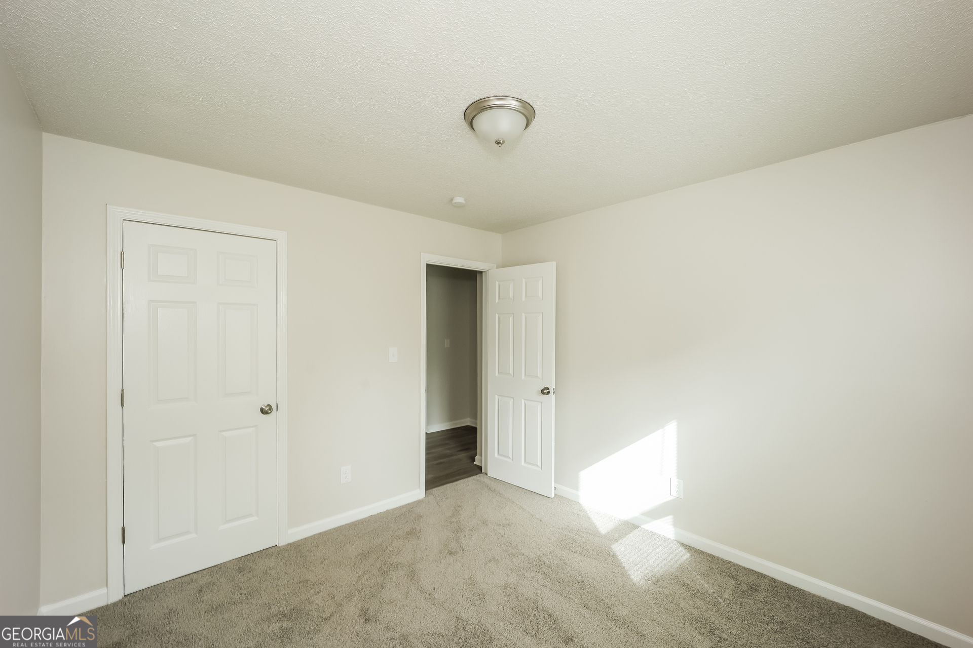 202 Wesley Mill Way Villa Rica, GA 30180 - Photo 12 of 17 a view of a livingroom with an empty space