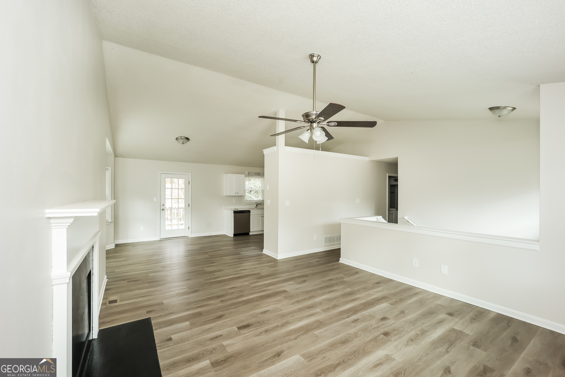 202 Wesley Mill Way Villa Rica, GA 30180 - Photo 6 of 17 a view of empty room with wooden floor