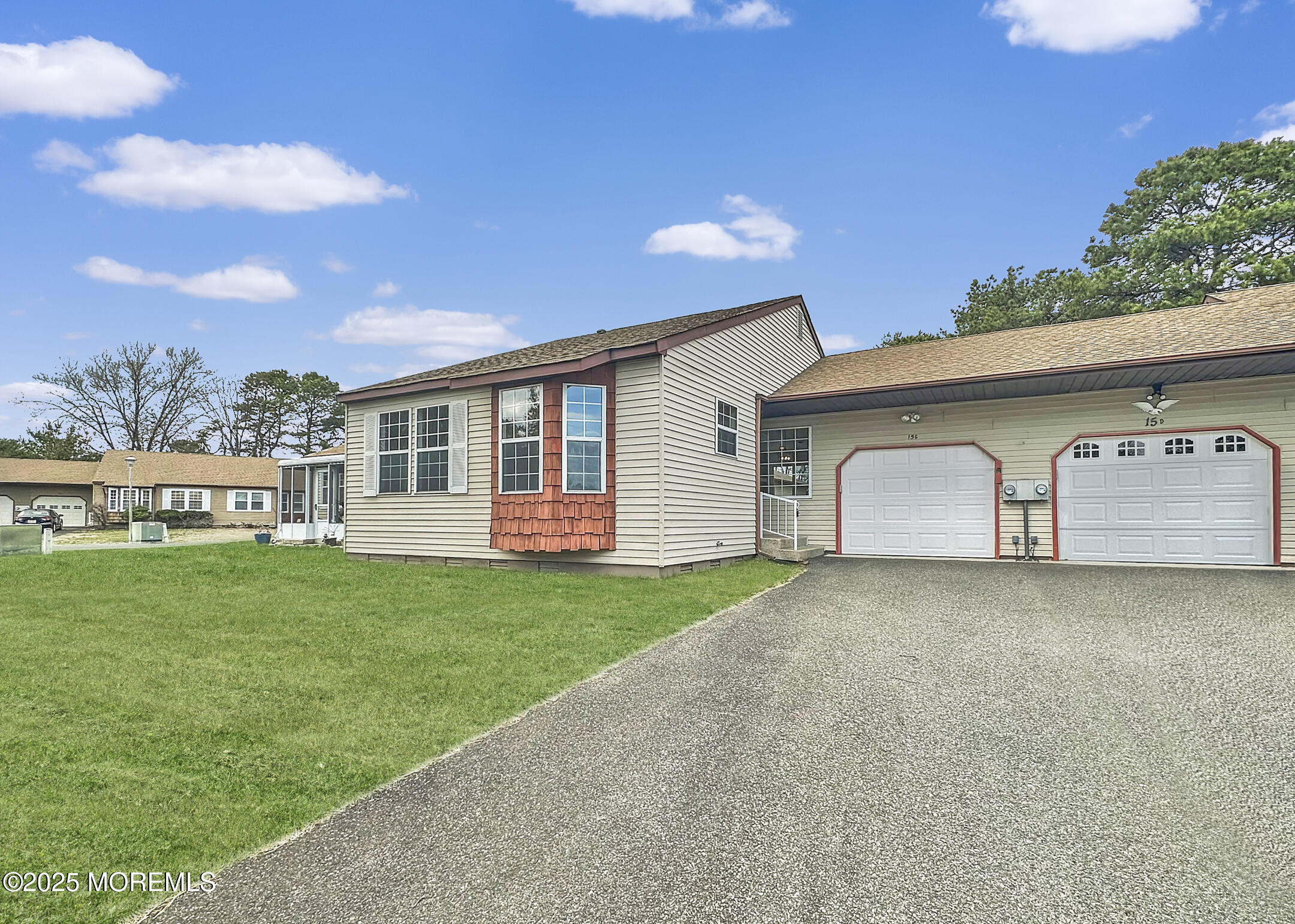 15D Alpine Road, Unit C Whiting, NJ 08759 - Photo 2 of 36 a front view of a house with garden