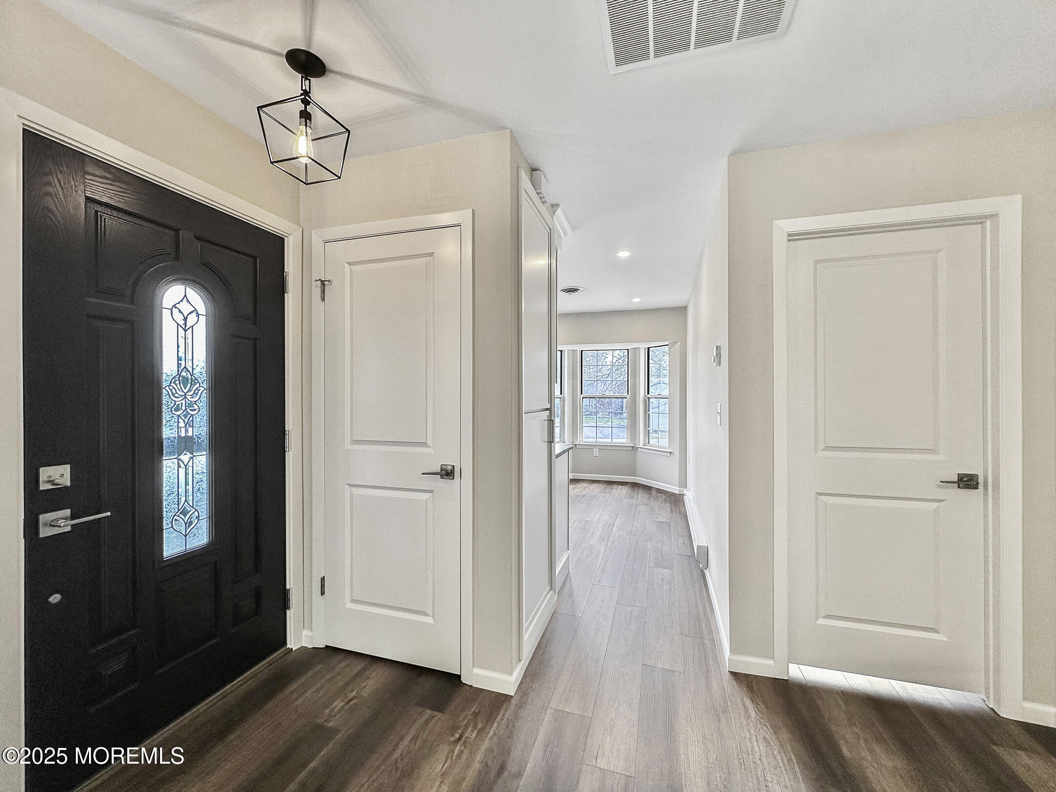 15D Alpine Road, Unit C Whiting, NJ 08759 - Photo 10 of 36 a view of a hallway with wooden floor