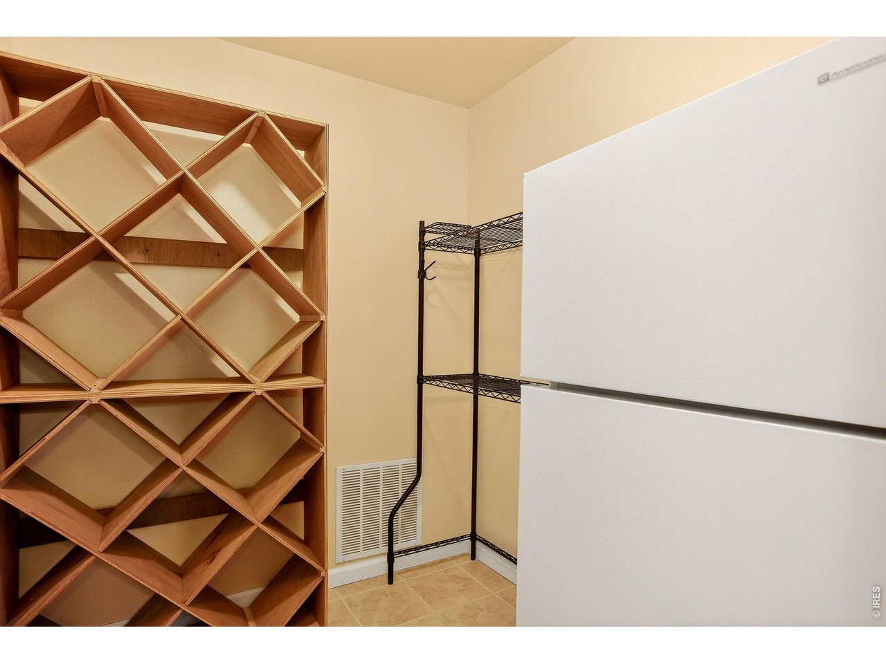 7514 19th St Road Greeley, CO 80634 - Photo 31 of 50 Wine Cellar with Full Refrigerator