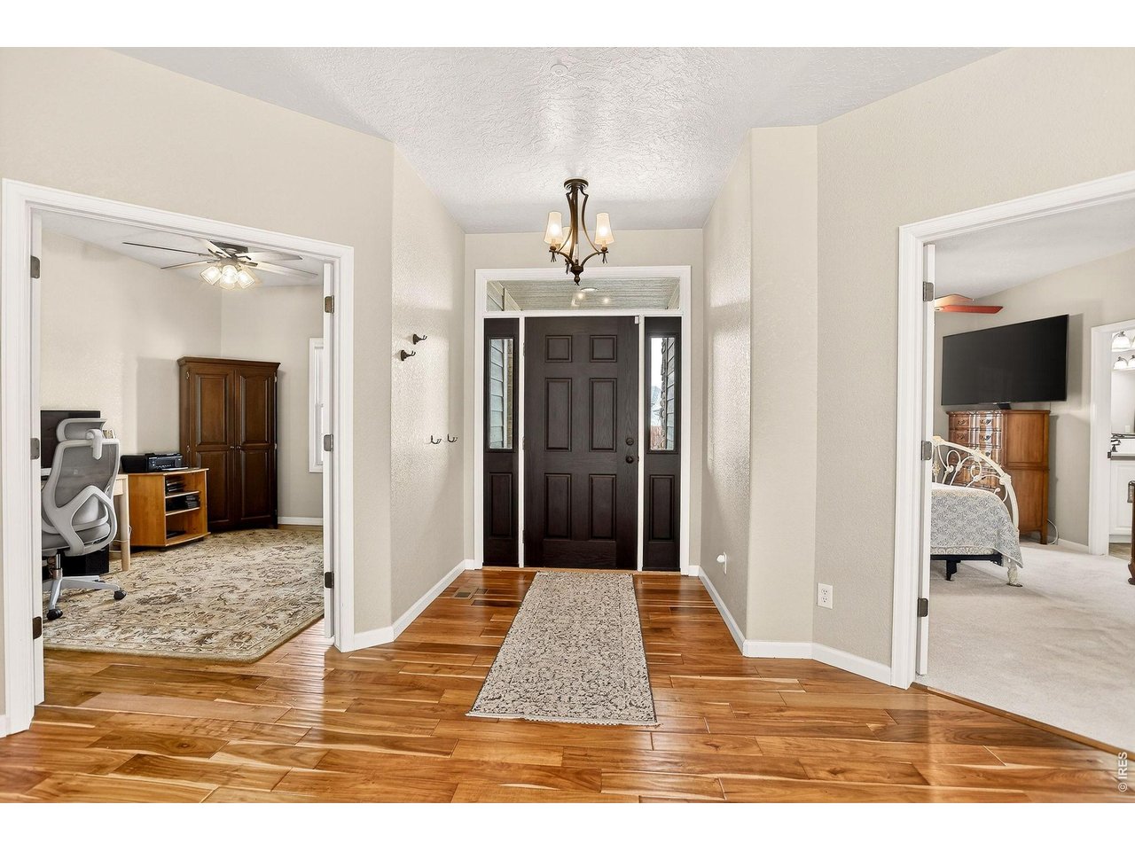 7514 19th St Road Greeley, CO 80634 - Photo 4 of 50 Front Foyer - Spectacular Wood Floors