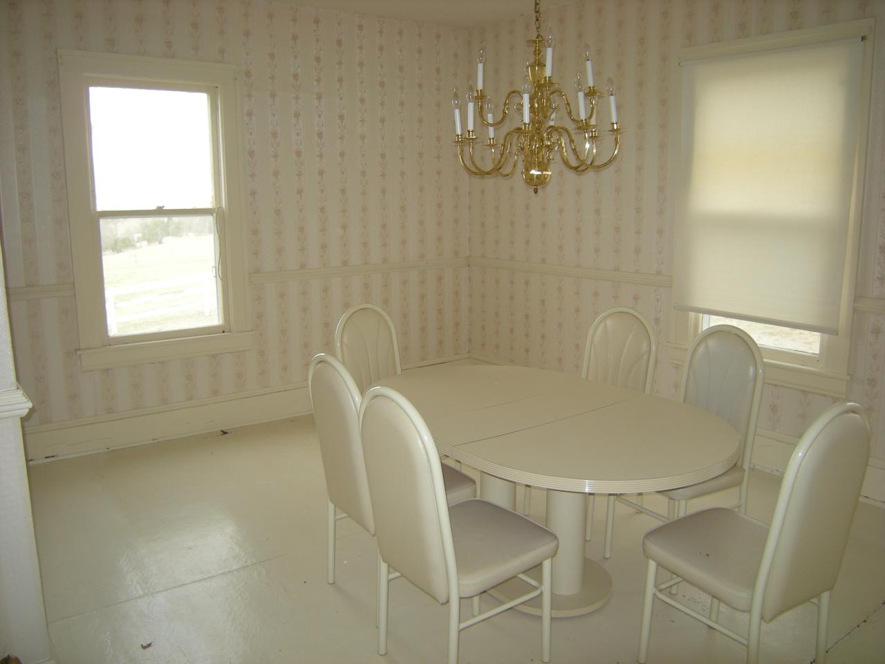 5222 Blacksburg Road Troutville, VA 24175 - Photo 11 of 38 a bath room with a table and a chandelier