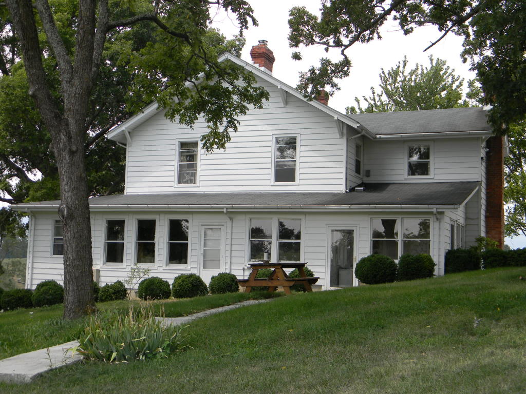 5222 Blacksburg Road Troutville, VA 24175 - Photo 4 of 38 a front view of a house with a garden