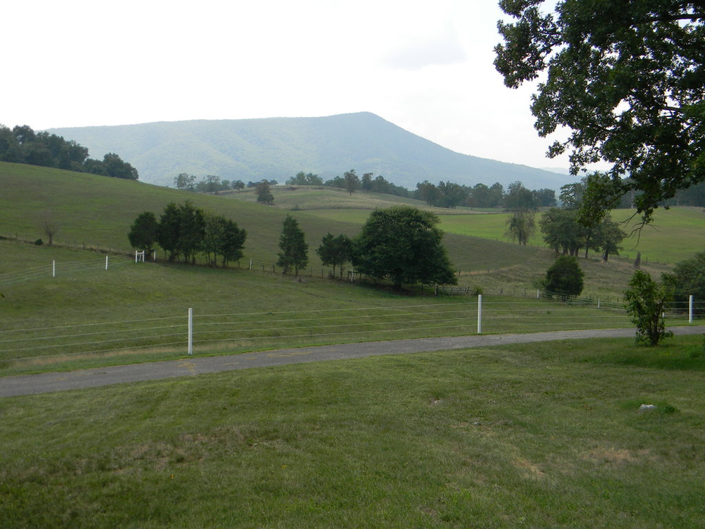 5222 Blacksburg Road Troutville, VA 24175 - Photo 33 of 38 a view of a lake with a mountain in the background