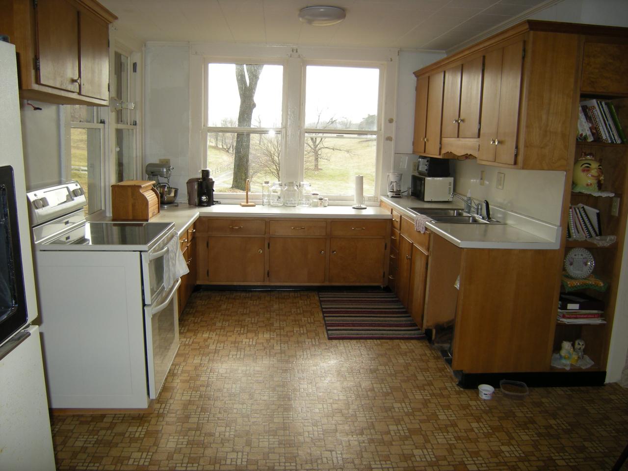 5222 Blacksburg Road Troutville, VA 24175 - Photo 8 of 38 a kitchen with stainless steel appliances granite countertop a sink stove and cabinets