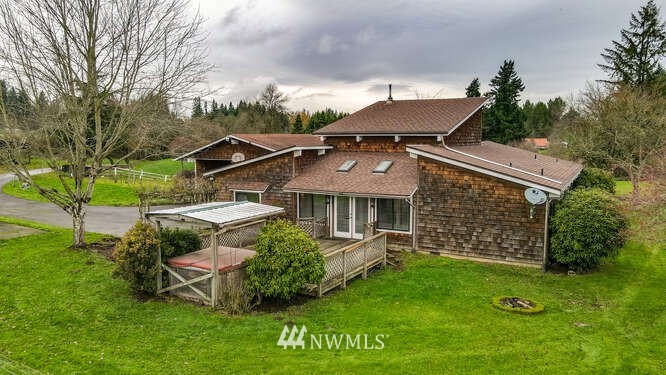 417 Northeast 209th Street Ridgefield, WA 98642 - Photo 22 of 30 a view of a house with a yard