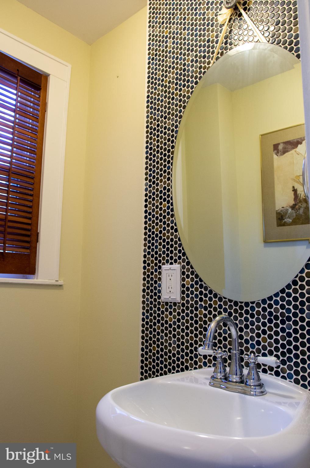 19201 Cardinal Heights Road Triangle, VA 22172 - Photo 42 of 66 Custom tilework in downstairs powder room