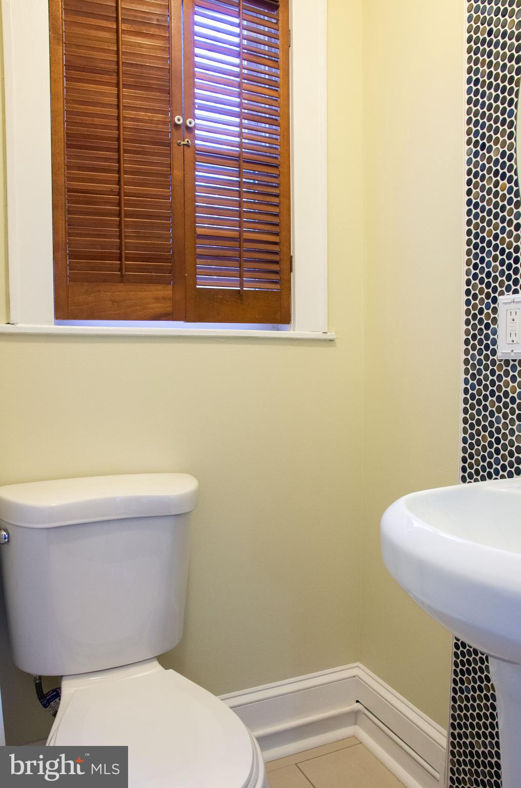 19201 Cardinal Heights Road Triangle, VA 22172 - Photo 43 of 66 Wooden shutters give privacy for powder room