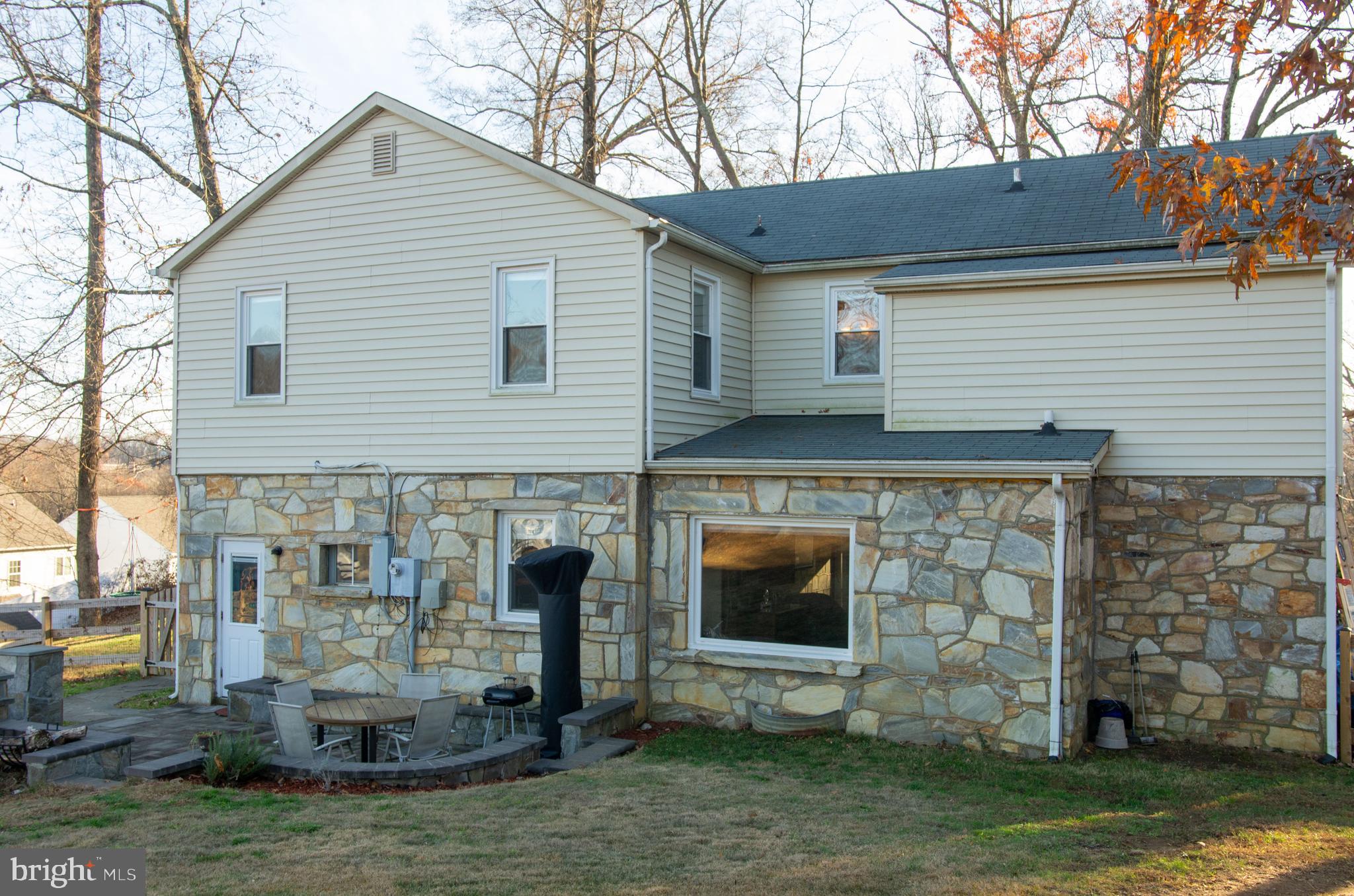 19201 Cardinal Heights Road Triangle, VA 22172 - Photo 56 of 66 Dining room bay window offers nice view of backyar
