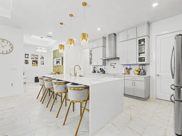 a bedroom with a bed and a chair