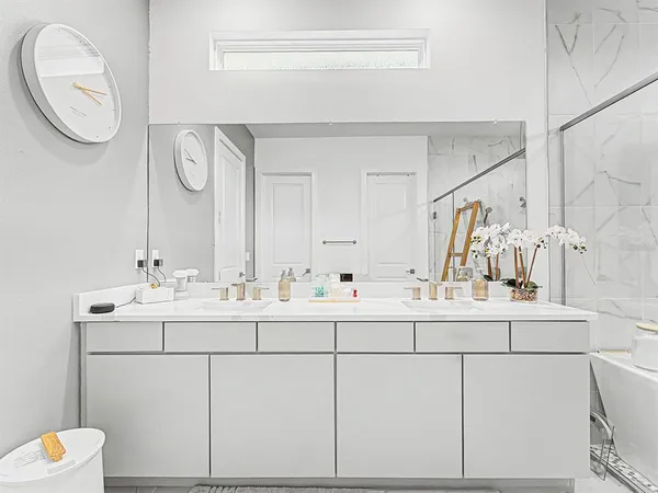 a view of a big room with windows and closet