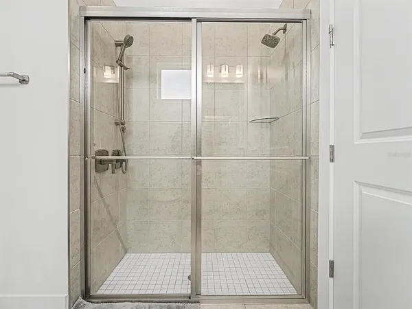 a view of a lobby with furniture and floor to ceiling window