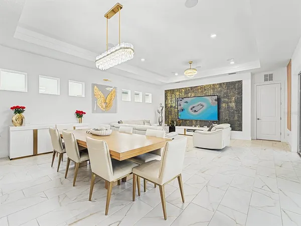 a view of a swimming pool with a yard