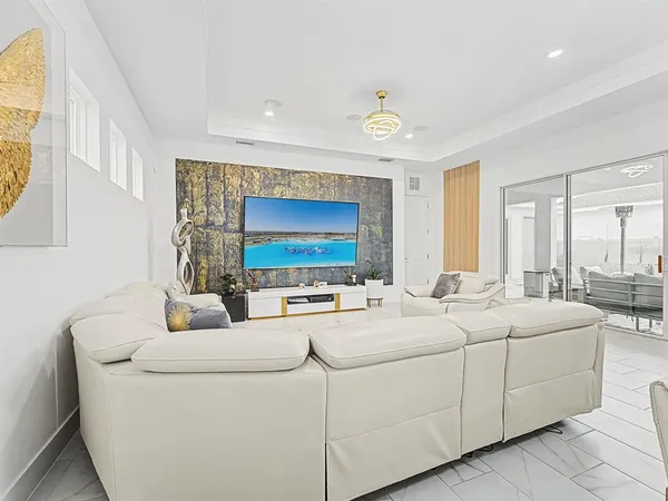 an aerial view of a swimming pool and outdoor space