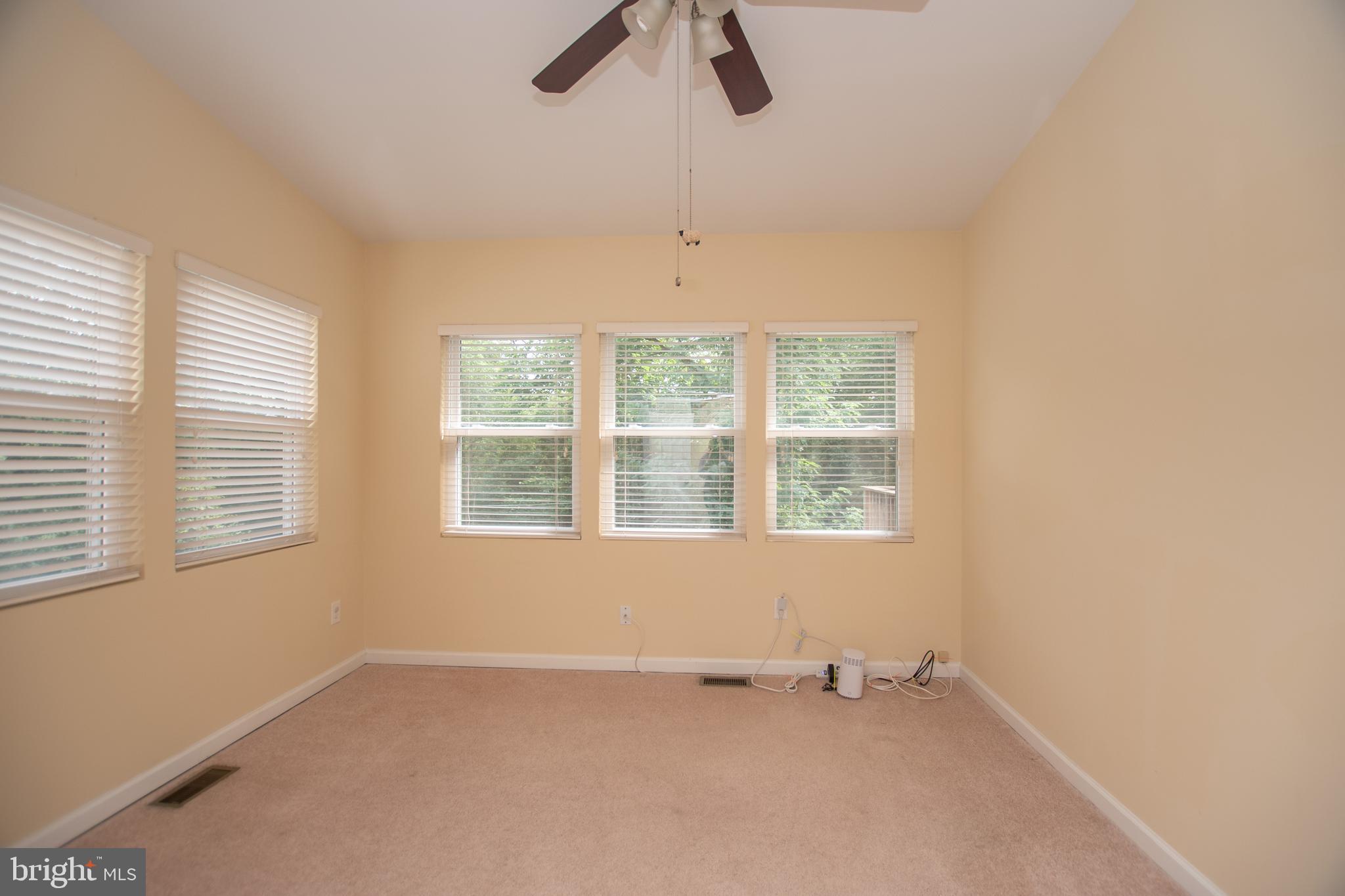 67 Edmondson Ridge Road Baltimore, MD 21228 - Photo 25 of 41 a view of an empty room with a window