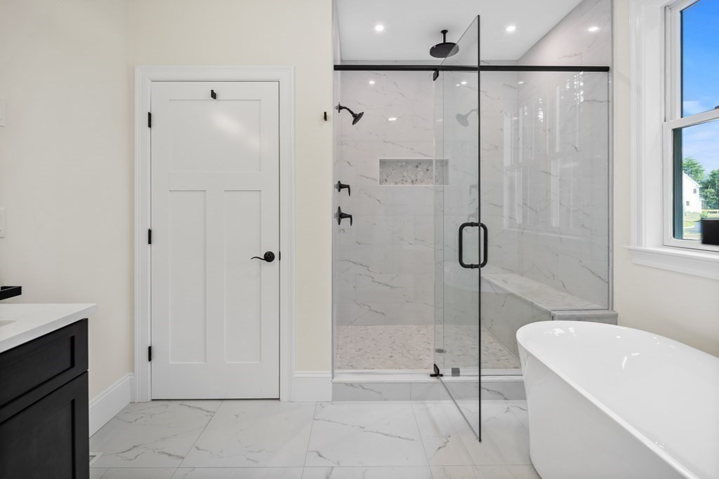 5 Isabella Circle Canton, MA 02021 - Photo 13 of 24 a bathroom with a shower and a tub