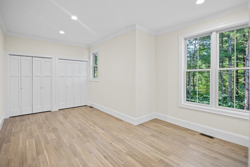 5 Isabella Circle Canton, MA 02021 - Photo 16 of 24 wooden floor in an empty room with a window