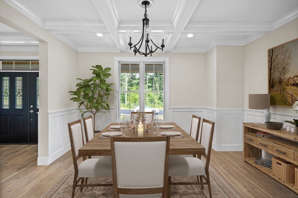 5 Isabella Circle Canton, MA 02021 - Photo 2 of 24 a view of a dining room with furniture window and wooden floor