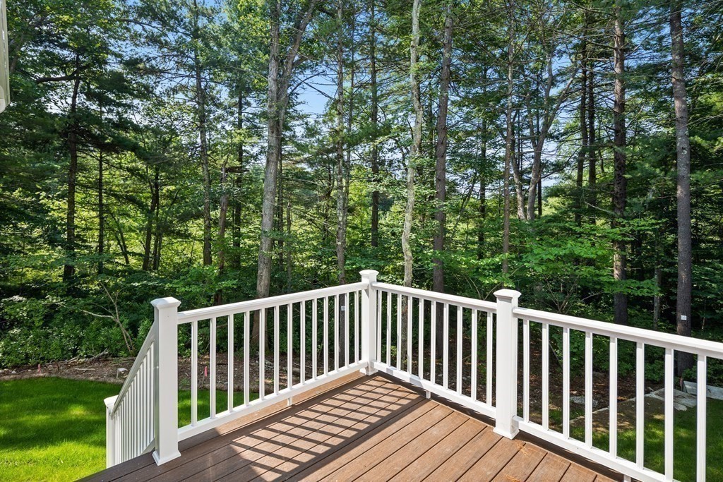 5 Isabella Circle Canton, MA 02021 - Photo 21 of 24 a balcony with wooden floor and fence