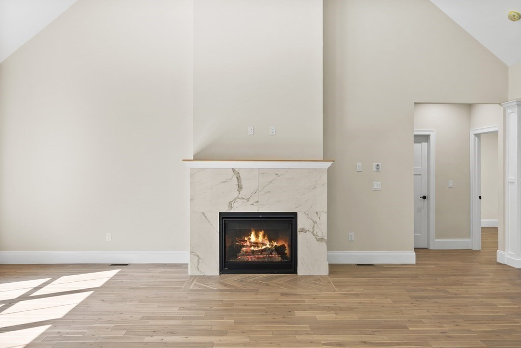 5 Isabella Circle Canton, MA 02021 - Photo 9 of 24 a room with a fireplace